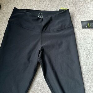 Black never worn with tags. Nike high rise crop trainers